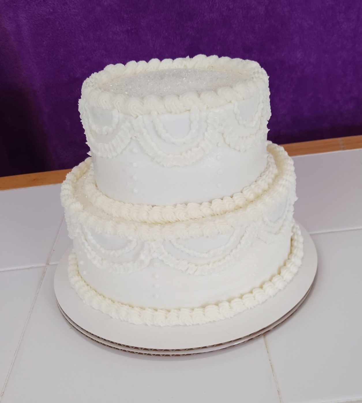 Classic white tiered wedding cake
